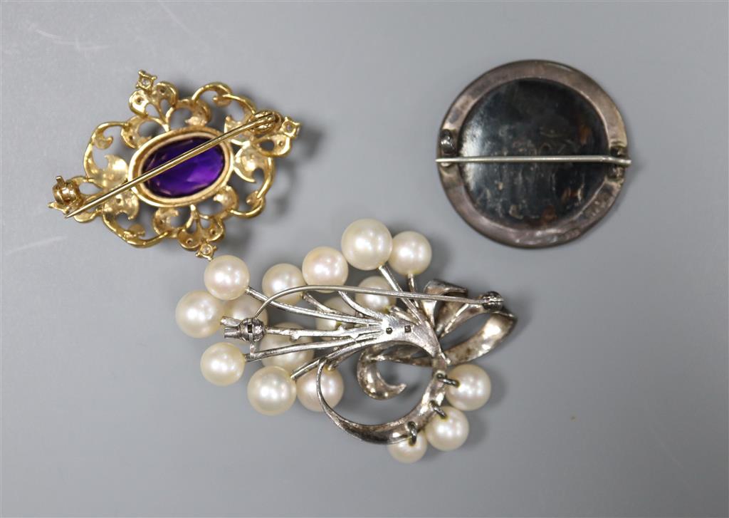 A Victorian style 9ct. gold, amethyst and diamond chip brooch, and RFC brooch and a simulated pearl brooch